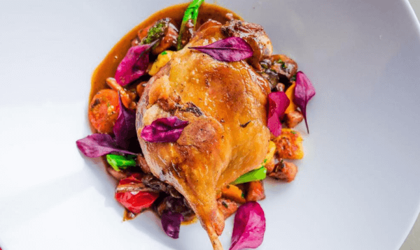 Duck confit with seasonal vegetables